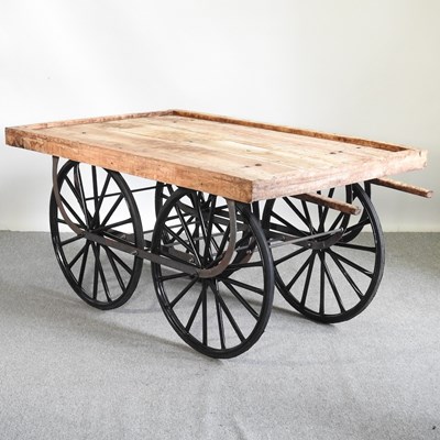 Lot 29 - A thela wooden hand cart, on a metal base,...