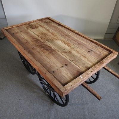 Lot 29 - A thela wooden hand cart, on a metal base,...