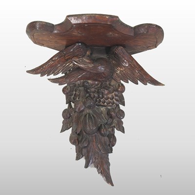 Lot 477 - A 19th century carved oak corner wall bracket