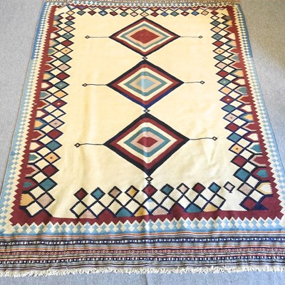 Lot 97 - A Persian quashqai kelim rug, with three...