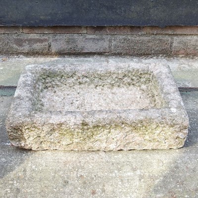 Lot 335 - A carved stone garden trough