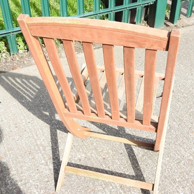 Lot 275 - A set of four teak folding garden chairs (4)