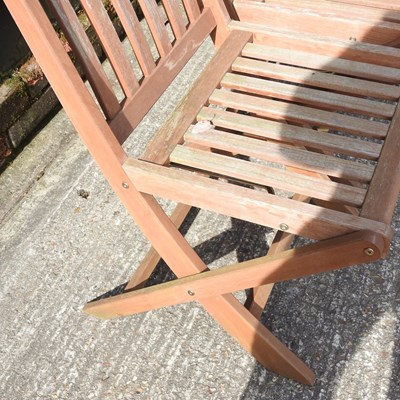 Lot 275 - A set of four teak folding garden chairs (4)