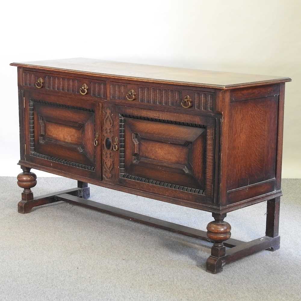 Lot 546 - A 1920's oak sideboard