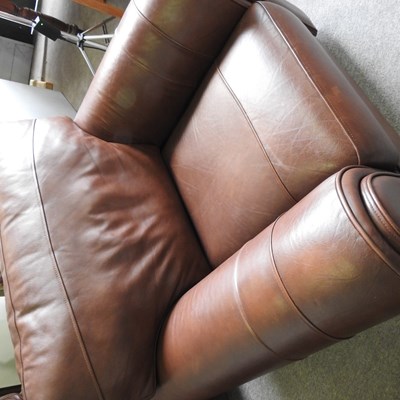 Lot 328 - A modern brown leather three piece suite,...