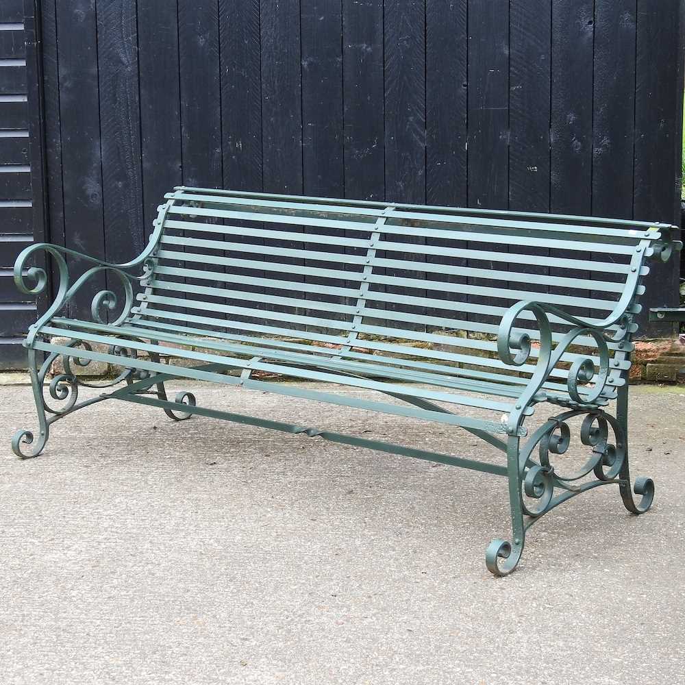 Lot 479 - A large hand forged green painted cast iron...