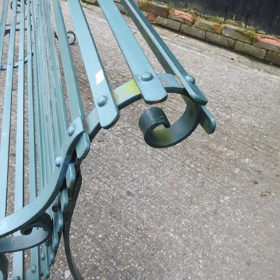 Lot 479 - A large hand forged green painted cast iron...