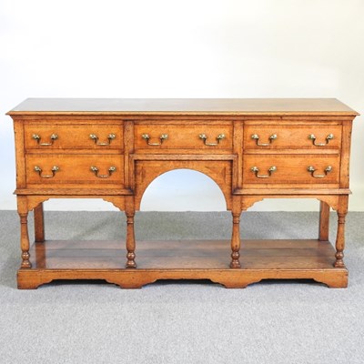 Lot 13 - An 18th century style oak dresser base, with a...