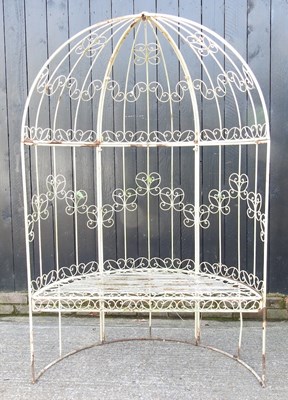 Lot 632 - A white painted metal garden arbour bench