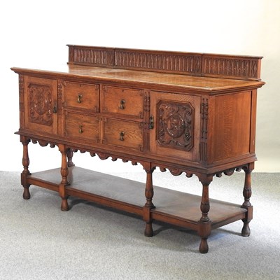 Lot 643 - An early 20th century oak sideboard