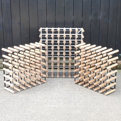 Lot 49 - A wooden and metal wine rack, 71cm, together...