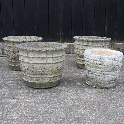 Lot 348 - A set of three reconstituted stone planters