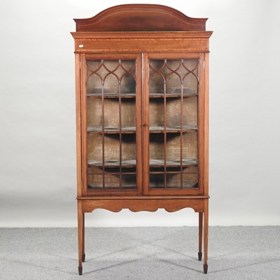 Lot 453 - An Edwardian inlaid mahogany display cabinet