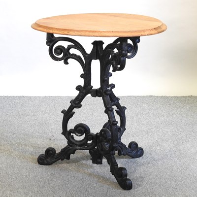 Lot 404 - A Victorian style black painted cast iron bistro table