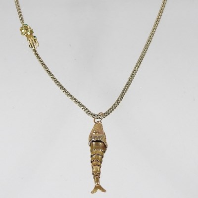 Lot 56 - A gilt flexible link necklace, with a clasp in...