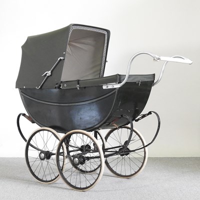 Lot 200 - A mid 20th century green London Baby Carriage...