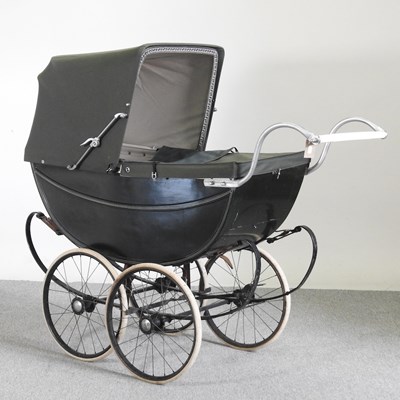 Lot 200 - A mid 20th century green London Baby Carriage...