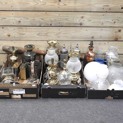Lot 283 - A collection of oil lamps and table lamps,...