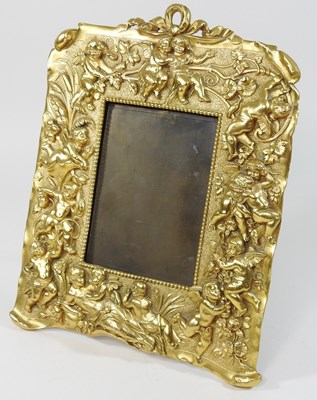 Lot 121 - An ornate gilt brass photograph frame