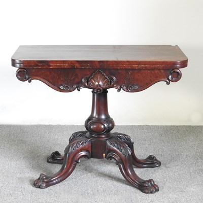 Lot 277 - A William IV carved mahogany folding card...