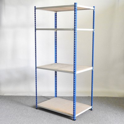 Lot 288 - A blue and cream painted metal shelving unit,...