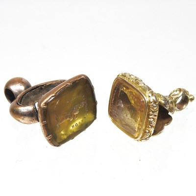 Lot 9 - A 19th century citrine seal, carved with a dog,...