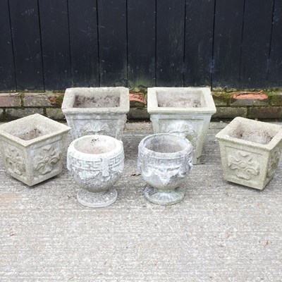 Lot 285 - A pair of cast stone garden pots, 30cm high,...