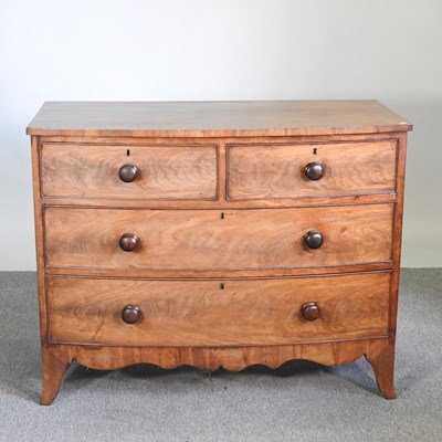 Lot 135 - A 19th century mahogany bow front chest of...