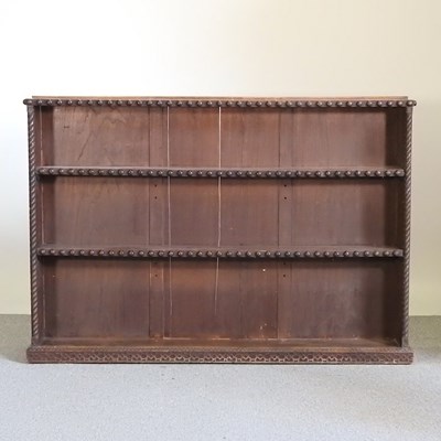 Lot 173 - A 19th century dwarf oak open bookcase, with...