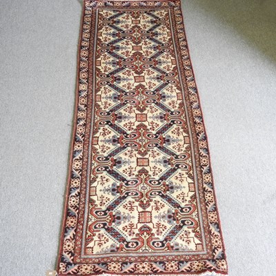 Lot 123 - A Persian ardebil runner, with foliate designs,...