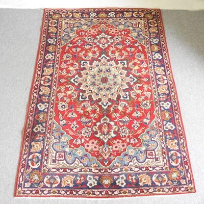 Lot 53 - A Persian Isfahan rug, with a central...