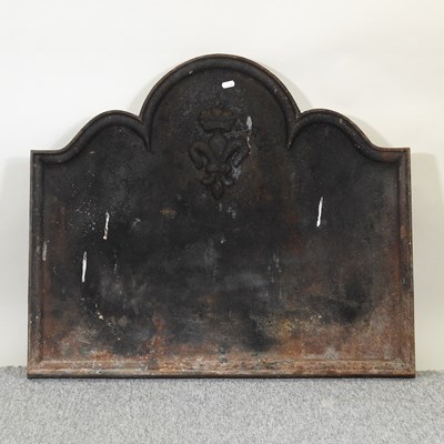 Lot 452 - A black cast iron fireback