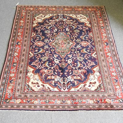 Lot 122 - A Persian sarouk rug, with a central medallion...