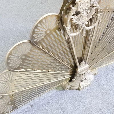 Lot 504 - A Victorian peacock fan fire screen, 68cm high