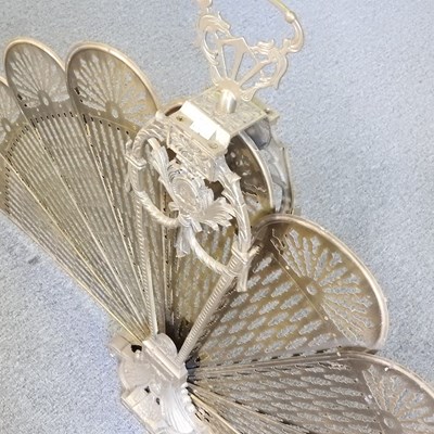 Lot 504 - A Victorian peacock fan fire screen, 68cm high