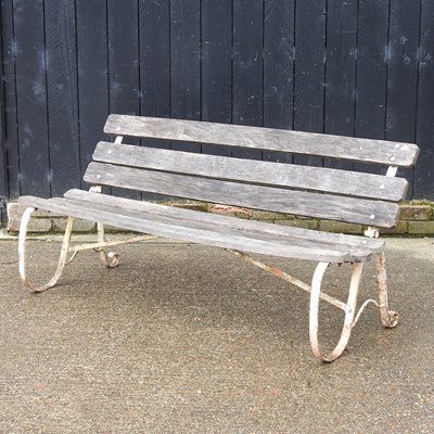 Lot 289 - A metal folding garden bench, with a slatted...