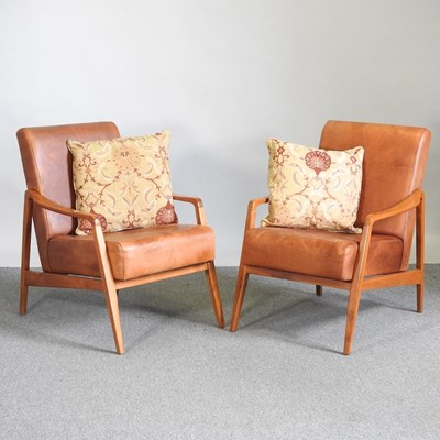 Lot 190 - A pair of 1960's style teak and brown leather...