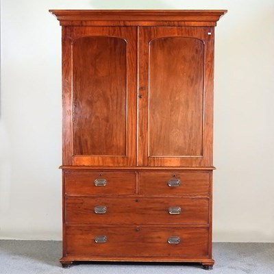 Lot 344 - A Victorian mahogany linen press, fitted with...