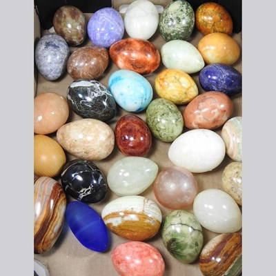 Lot 13 - A collection of various polished hardstone eggs