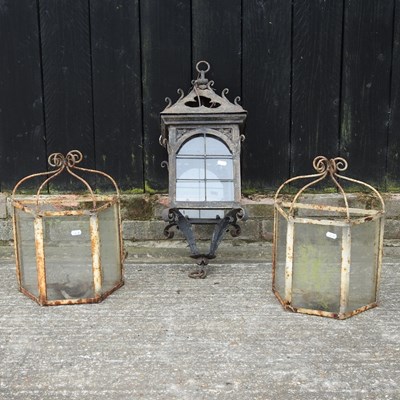 Lot 351 - An ornate wrought iron hanging lantern