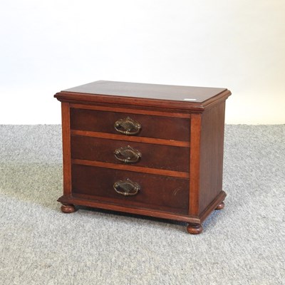 Lot 668 - An Edwardian style walnut miniature chest