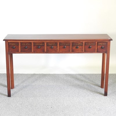 Lot 87 - A mahogany reproduction apothecary table, with...