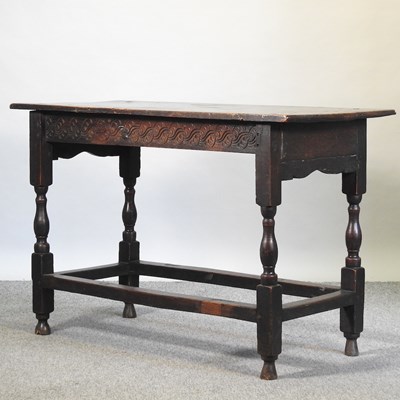 Lot 669 - An 18th century and later oak side table