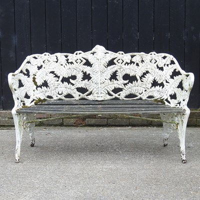 Lot 10 - An ornate white painted cast iron...