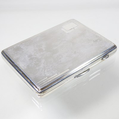 Lot 20 - An early 20th century silver cigarette case,...