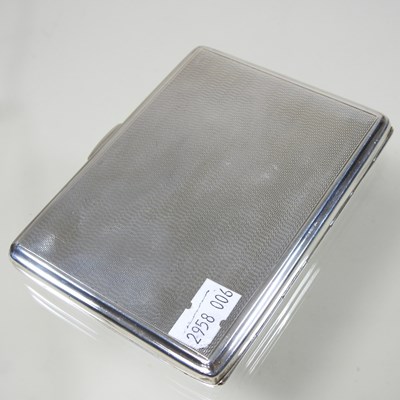 Lot 20 - An early 20th century silver cigarette case,...