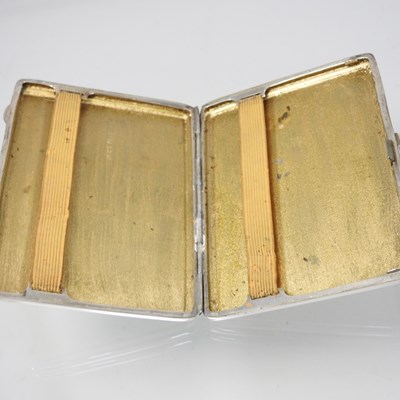 Lot 20 - An early 20th century silver cigarette case,...