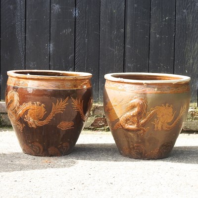 Lot 208 - A pair of oriental glazed garden pots, 41cm...