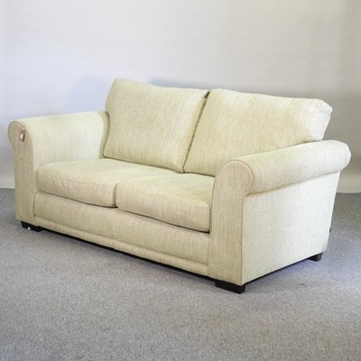 Lot 670 - A Next green upholstered sofa