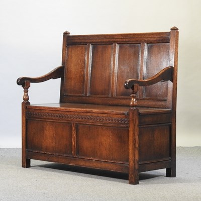 Lot 672 - A 19th century oak settle